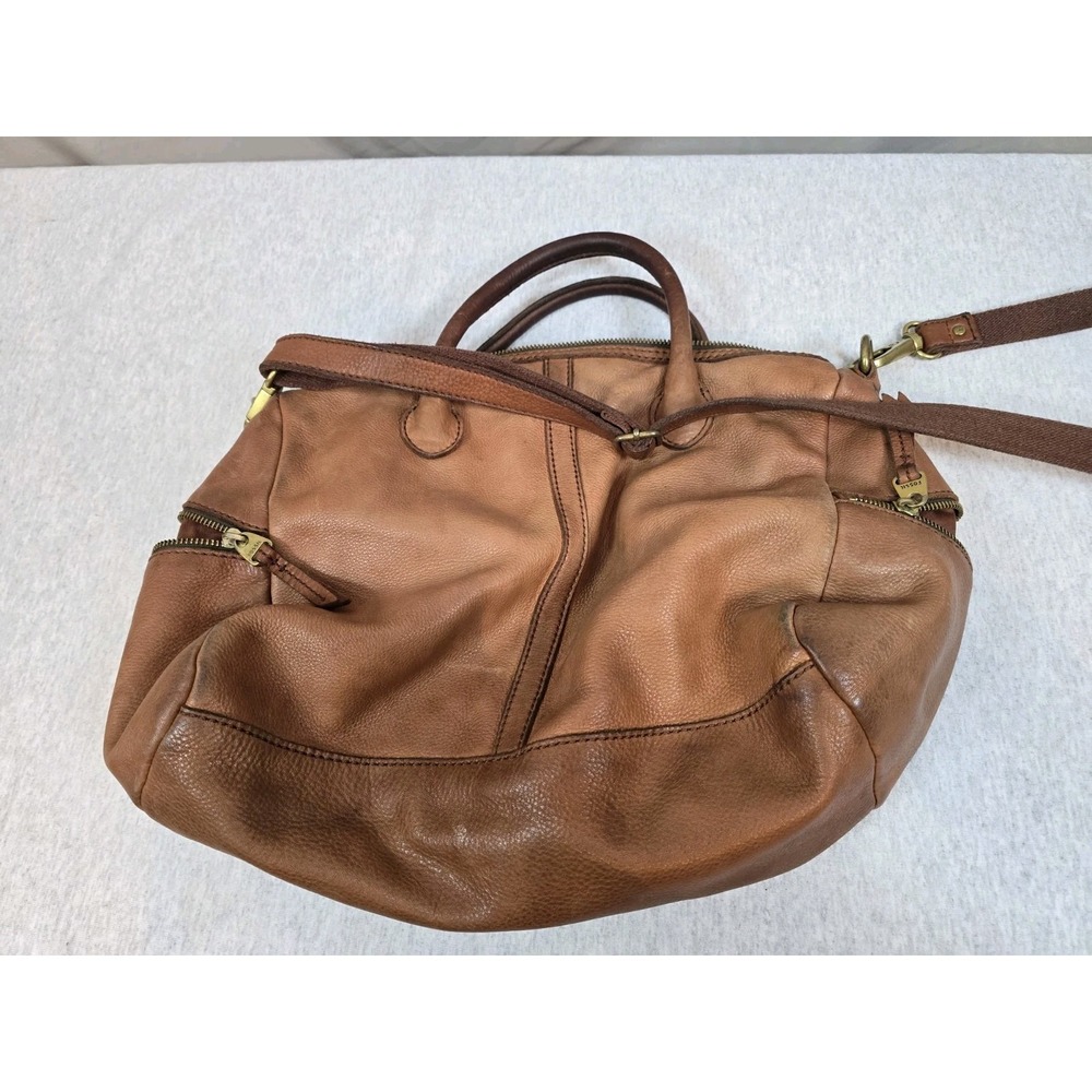 Older brown leather Fossil dome-shaped crossbody satchel purse